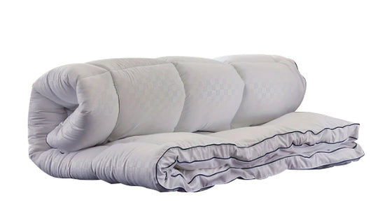 White mattress with fitted sheet